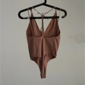 Free people body suit size xs/s